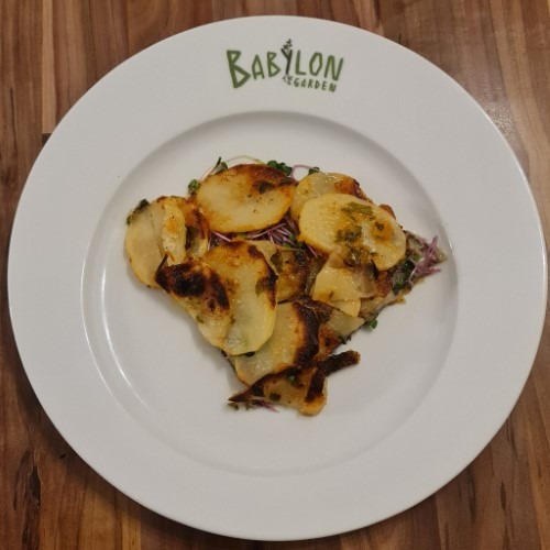 Pan-fried potatoes with microgreens